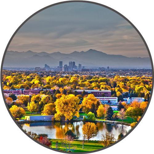 Aerial view of Denver with mountains in background